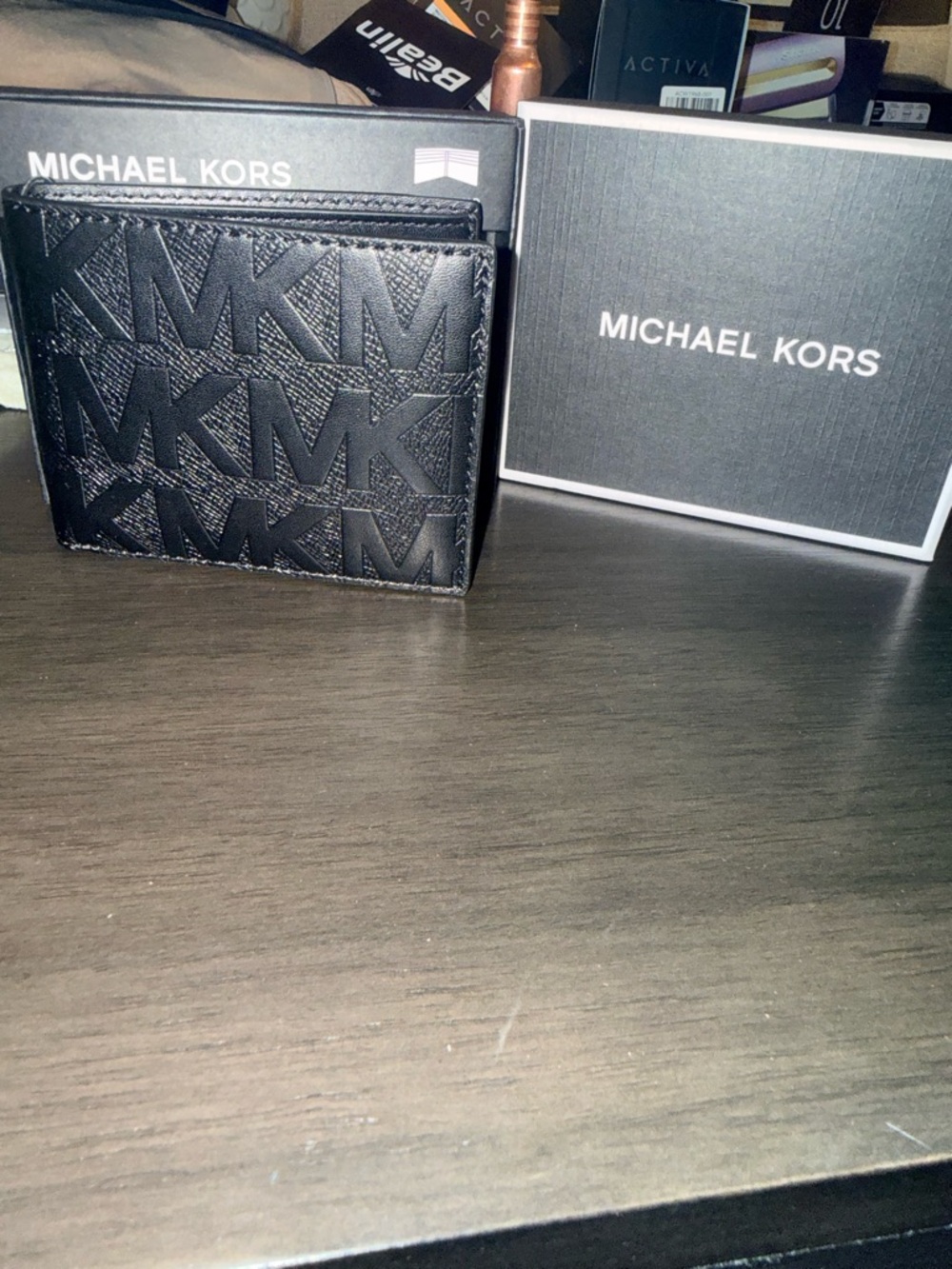 Michael Kors Black Embossed MK Bi-Fold Wallet